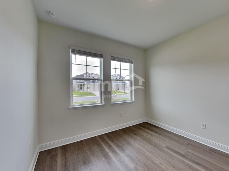 Building Photo - 5955 Pinewood Ests Dr