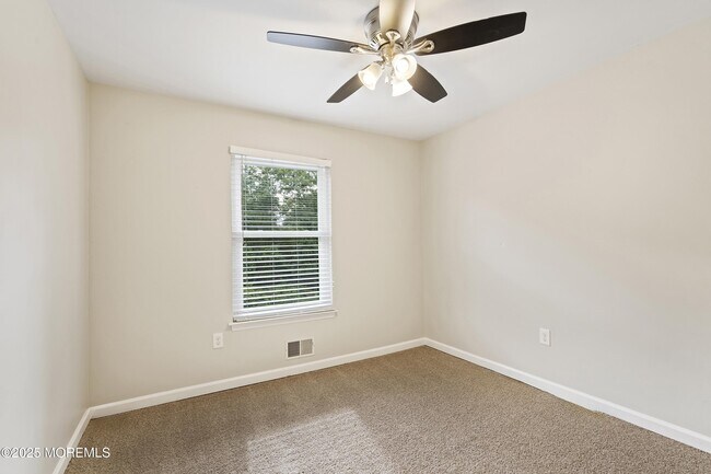 Building Photo - 122 Moses Milch Dr