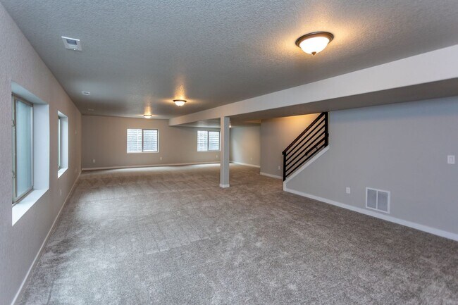 Building Photo - Exceptional 4-Bedroom Home with Dual Fireplaces, Main Level Master Suite, and Spacious Basement -...