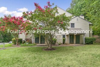 Building Photo - Charming 1st-Floor End-Unit Condo with Gas Log Fireplace, Private Back Porch & Community Pool – T...