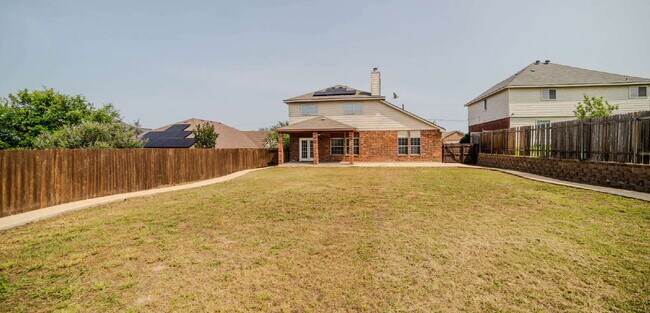 Building Photo - "Spacious 4-Bedroom Retreat with 2.5 Baths...