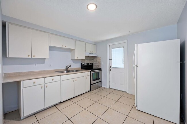 Building Photo - 408 60th Ave Dr W