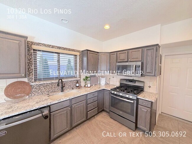 Building Photo - 10320 Rio Los Pinos Dr NW