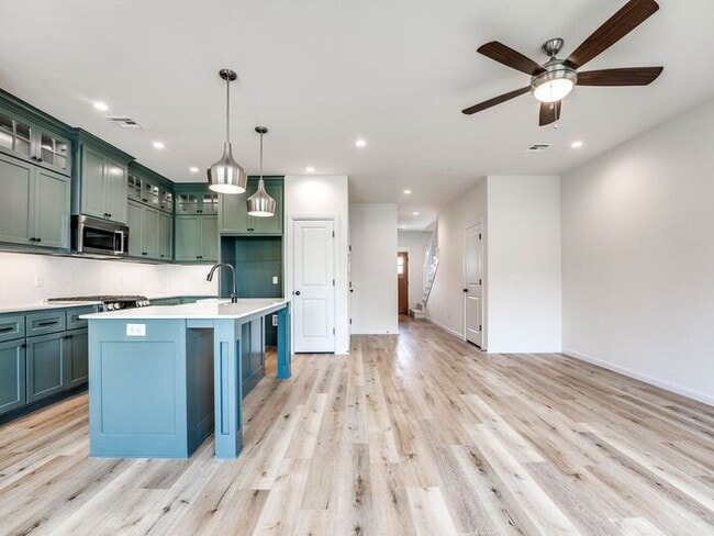 Building Photo - Luxury, Zero Maintenance Living Townhome