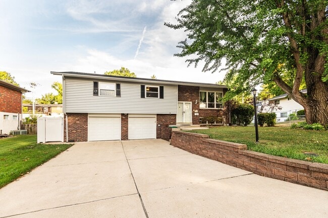 Primary Photo - Spacious 4-Bed, 2.5-Bath Split-Level Home