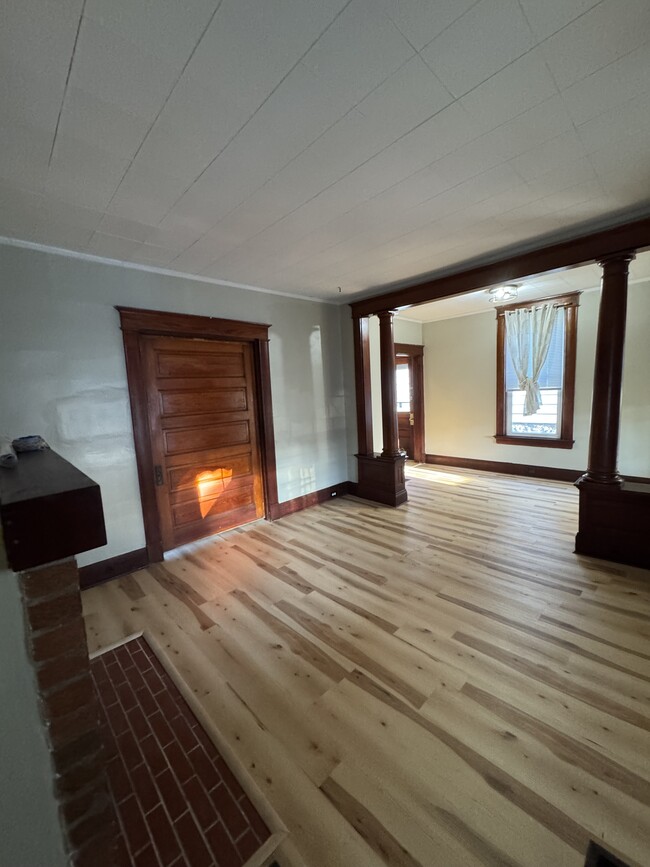 Living room with Picket Door closed - 925 Walnut St.