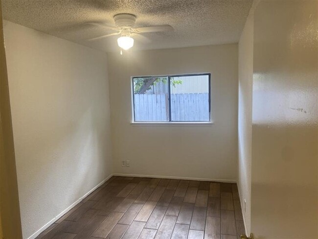 Building Photo - Large 2/2 duplex with a 2 car carport