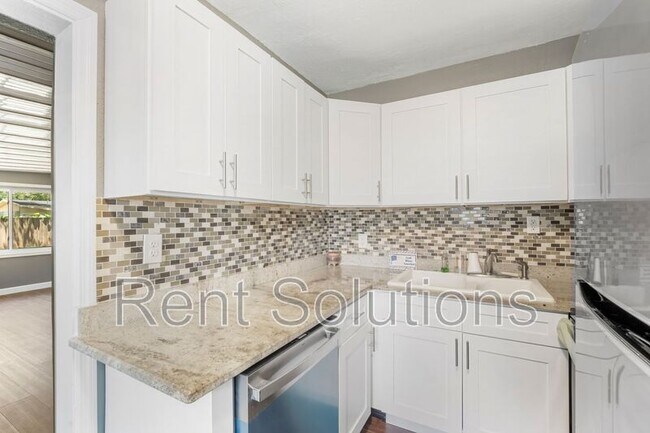 Building Photo - 4715 W Knights Ave