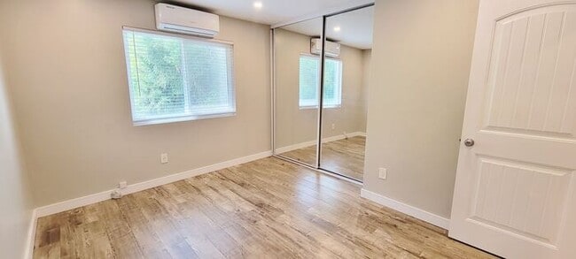 Building Photo - Charming 2BR Retreat with Private Patio, Scenic Views & Resort-Style Amenities