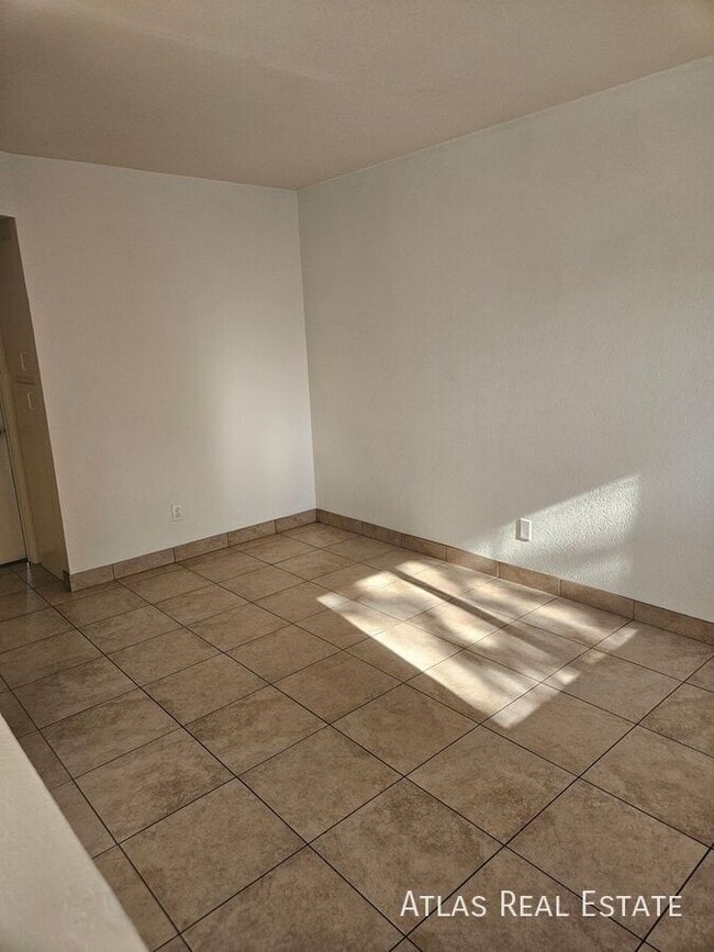 Building Photo - 111 N Phyllis-202