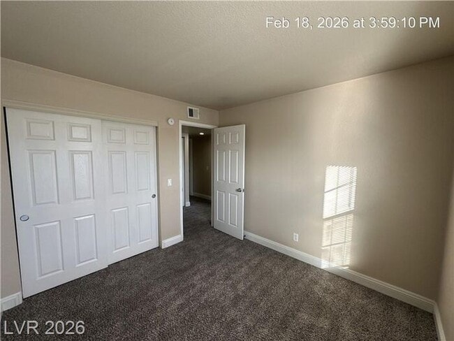 Building Photo - Bright Northwest Second-Floor Condo with Oversized Balcony & Community Pool!