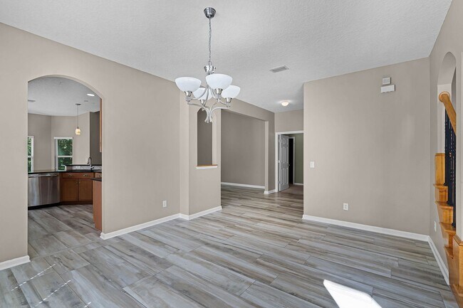 Building Photo - 4/2.5/2 Woodland Lakes Preserve Available Now
