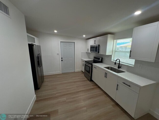 Building Photo - 10540 NW 28th Ave