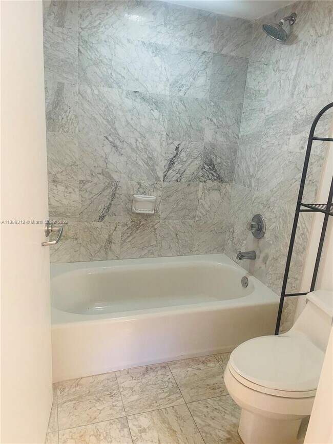 Building Photo - 8911 Collins Ave