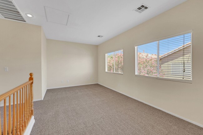 Building Photo - This beautifully updated 2-bedroom home is nestled in a gated community