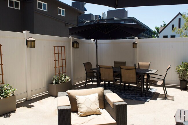 Entirely private patio space, not shared with the building. All outdoor furniture included! - 1410 N Curson Ave