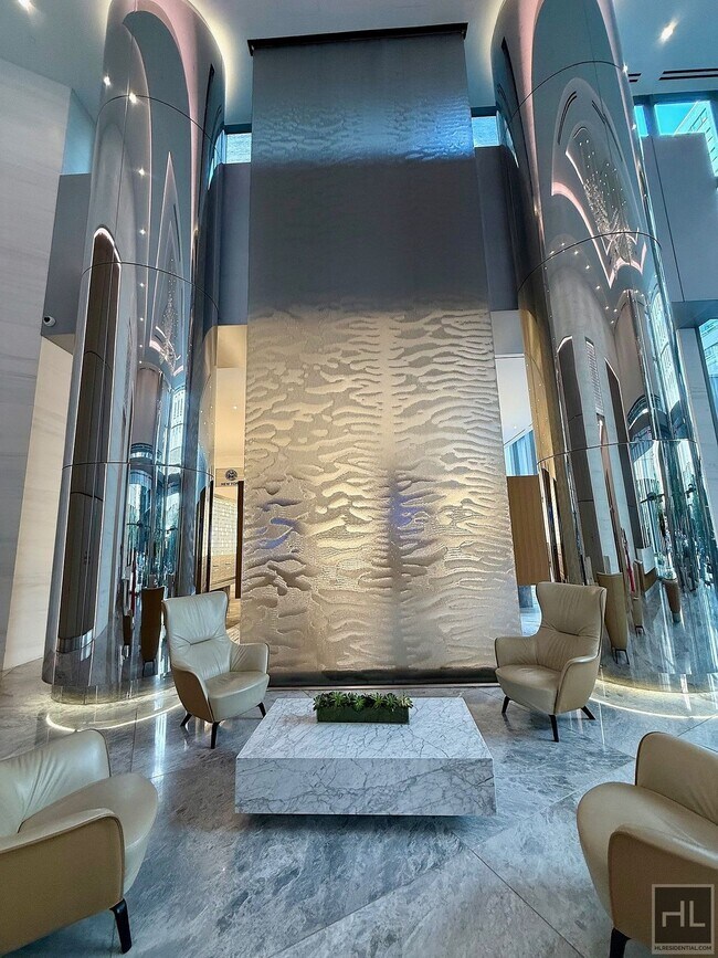 Building Photo - SUNNY NO FEE STUDIO IN THE LUXURY SUMMIT NYC