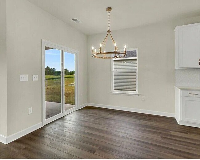Building Photo - Four bedroom two bath home in Trieste at B...