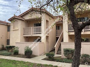 Building Photo - Las Palmas Upstairs Condo in Gated Community