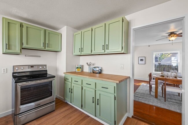 Building Photo - 1/2 Month Free! Storybook Farmhouse - Updated Kitchen, A/C, Basement, Fenced Yard, Garage, Laundr...