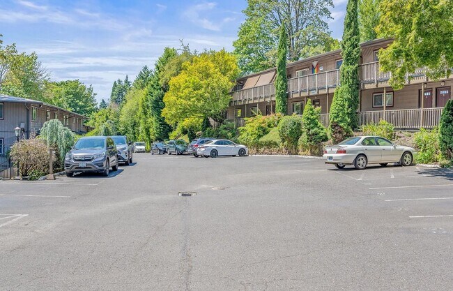 Building Photo - Spacious 2-Bedroom Condo with Forest Views, Private Balcony, In-Unit Laundry & Community Amenitie...