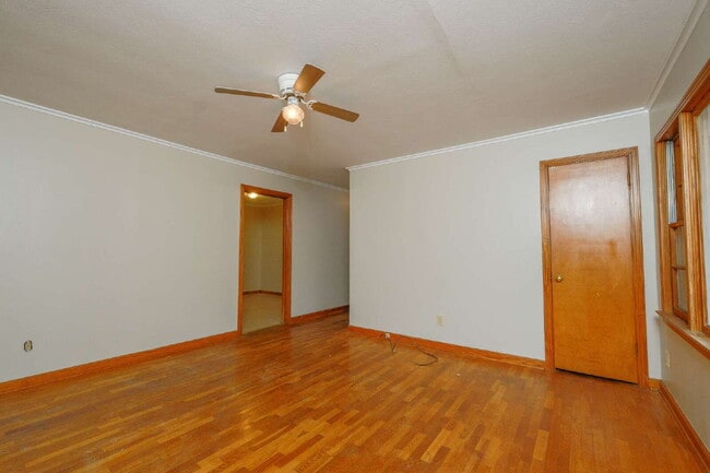 Building Photo - "Charming 3-Bedroom Greenfield Home with Gleaming Hardwood Floors – 1256 Sq Ft of Cozy Comfort!"