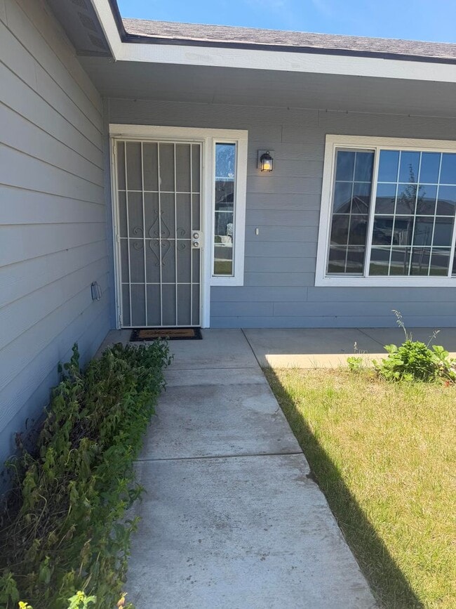 Building Photo - Lots of storage space in this 4- Car garage for all your playthings!!
