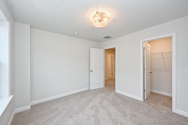 Building Photo - **BE THE LUCKY ONE TO LIVE IN THIS 2024-BUILT TOWNHOME**