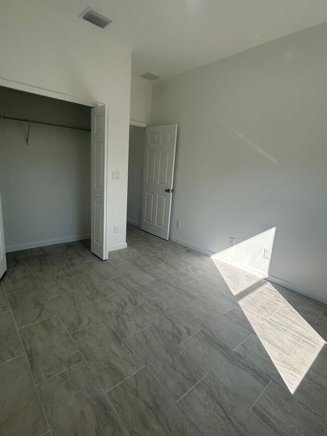 Building Photo - BRAND NEW CONSTRUCTION- 4 Bedroom 2 Bath-2 Car Garage-Serene Lake Placid Location