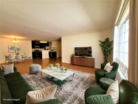 Staged living room - Bentley Ave. Apartments