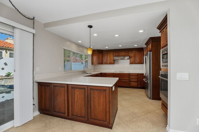 Building Photo - Coastal Elegance Meets Family Comfort in D...