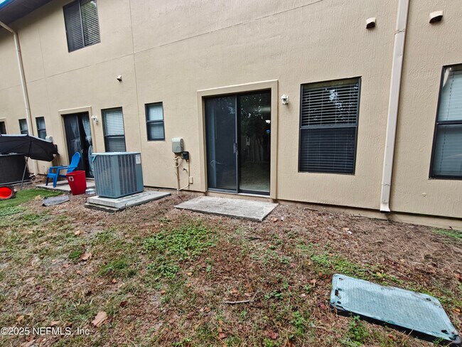 Building Photo - 7764 Playschool Ln
