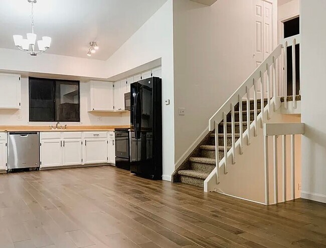 Building Photo - 4BR Tri-Level with Sunroom & Oversized Fenced Yard & 2-Car Garage!