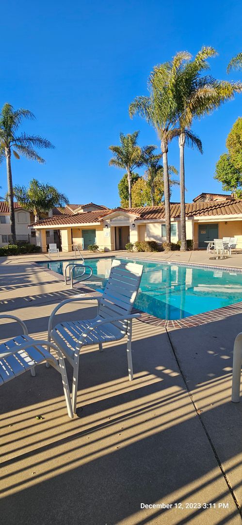 Building Photo - Downstairs Condo Located in the Gated Community of Las Palmas