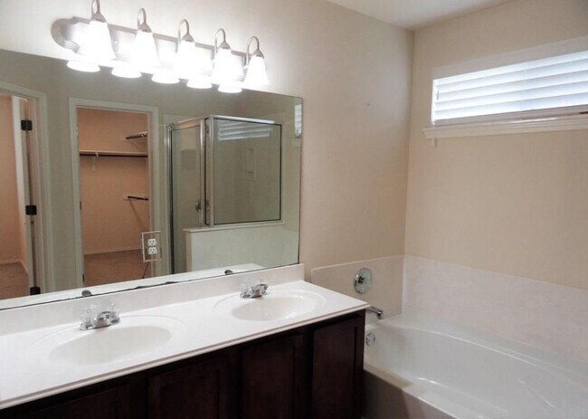 Building Photo - 7810 Squirrel Hollow Dr