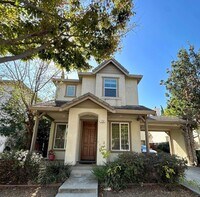 Building Photo - COMING SOON! Charming 4-bedroom, 2.5-bathr...