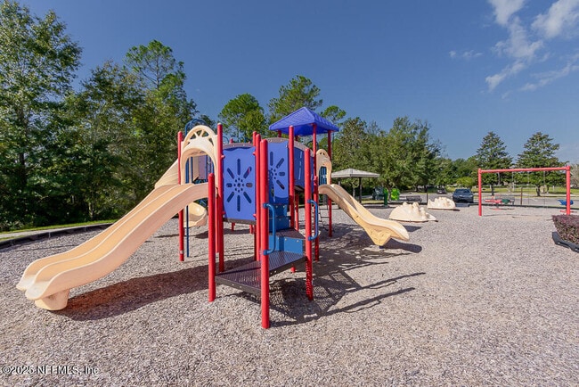 Building Photo - 4599 Plantation Oaks Blvd