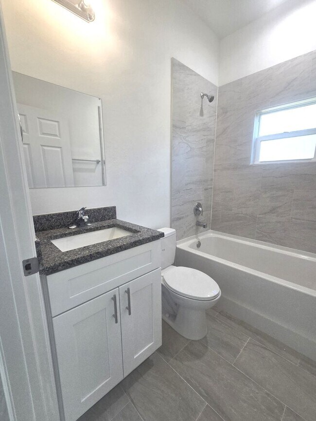 Building Photo - Brand New 4/2/2- South Lehigh Acres