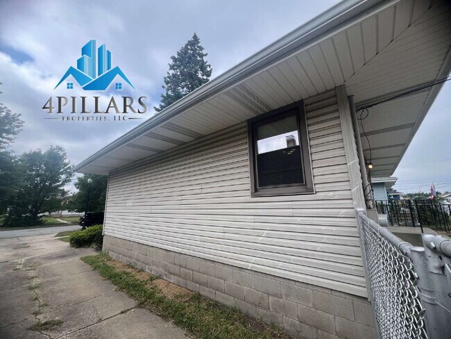 Building Photo - "Charming 3-Bedroom Haven with Finished Basement & Gleaming Hardwood Floors in Hammond!"