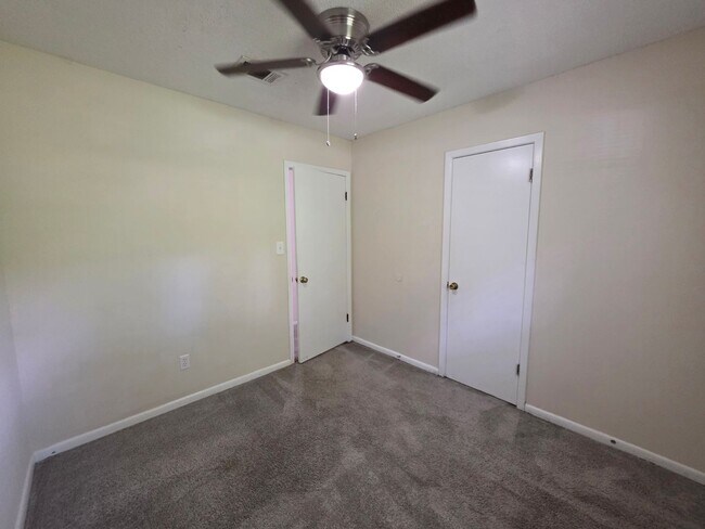Building Photo - Nicely updated 3BR/1.5BA with fenced in ba...