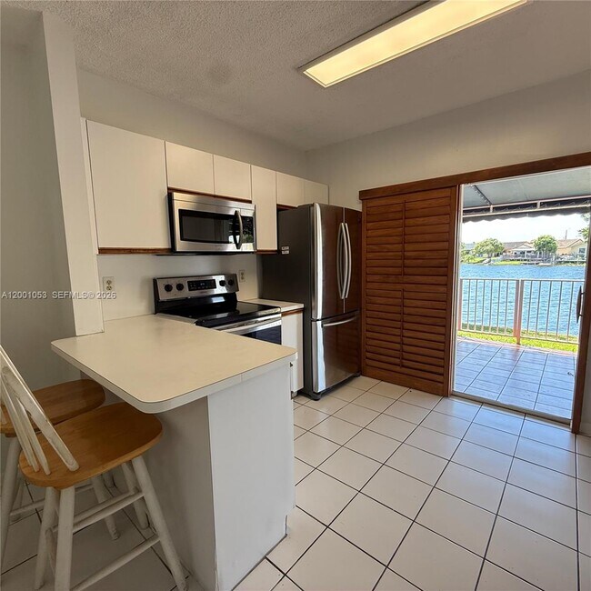 Building Photo - 6980 NW 173rd Dr