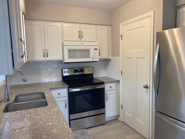 Building Photo - Cute Cape Cod in Forest Hills