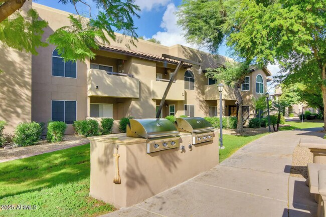 Building Photo - 9451 E Becker Ln