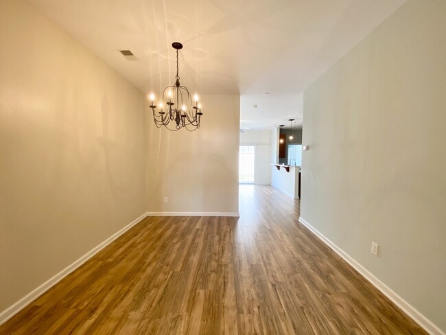 Building Photo - Spacious, Four Bedroom Townhouse With a View!