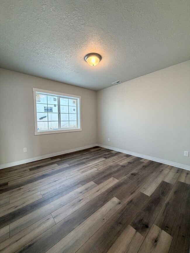 Building Photo - Beautiful Brand New 4-Bedroom, 2.5-Bathroom Duplex Style Townhome!