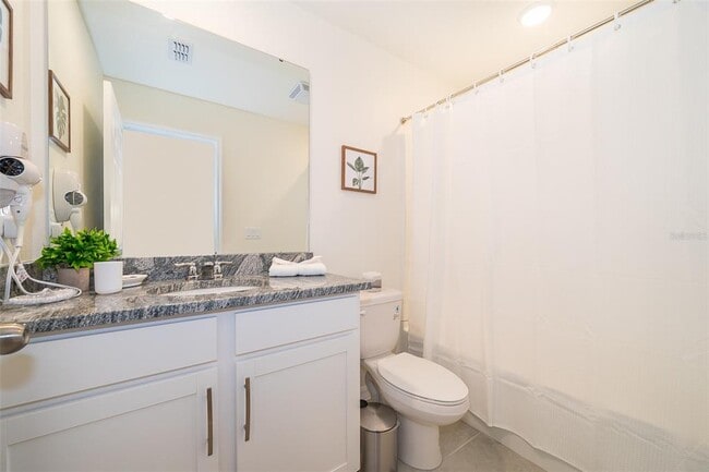 Building Photo - 1808 Tropical Palms Cir