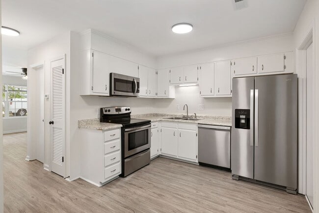 Building Photo - Available now. Water included. RENOVATED 2 BR/1.5 BA Townhouse in the Heart of James Island!