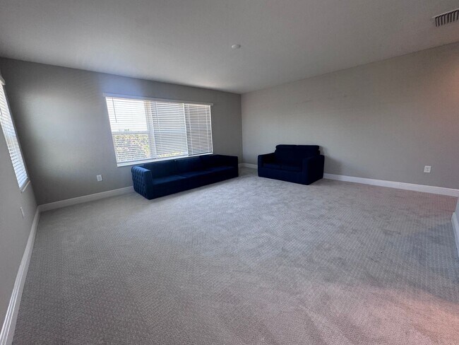 Building Photo - New Construction in Grand Park-4 Bedrooms and 4 Bathrooms with a Den and a Loft! No deposit for q...