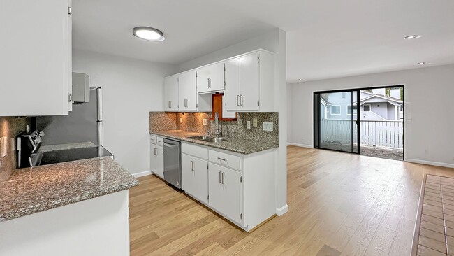 Building Photo - Waterfront Top-Floor West-Facing Apartment...