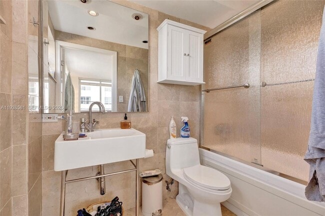 Building Photo - 5005 Collins Ave